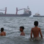 Iran and Oman edge toward temporary Strait of Hormuz reopening plan, but Tehran insists U.S. lift blockade