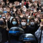 Riot police clash with students in Paris protests